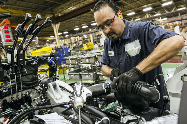 Service technician working on a forklift